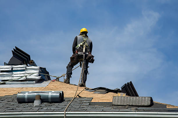 Professional Roof Replacement technician working in Montgomery, WV
